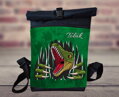 Rolovací batoh T-rex